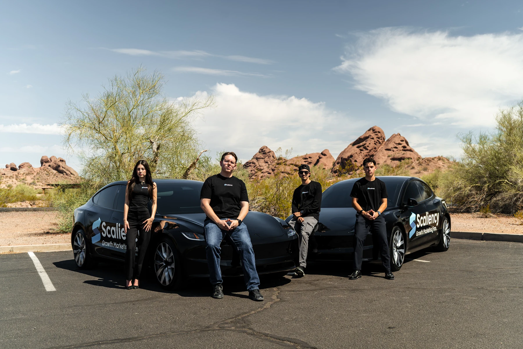 The Scaliency team with the wrapped cars in Phoenix